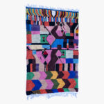 Kleurrijk berber tapijt met veelzijdige patronen en textuur, perfect voor een moderne of traditionele huisinrichting.