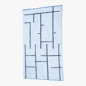 Modern berber tapijt met abstracte donkerblauwe lijnen op een lichte achtergrond, ideaal voor een hedendaagse inrichting.